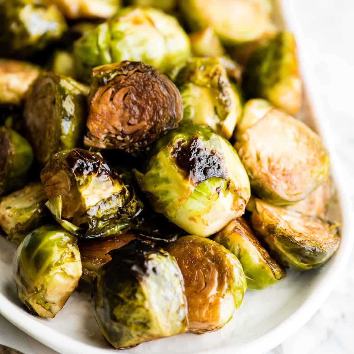 Overhead view of a serving dish with balsamic roasted brussel sprouts
