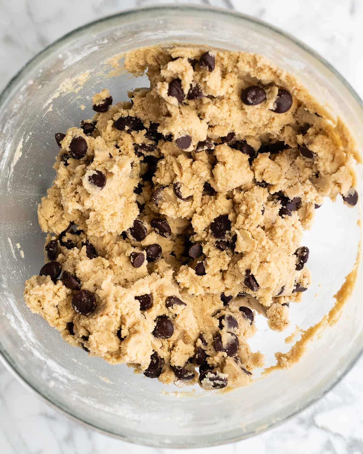 overhead photo of a bowl of chocolate chip cookie dough