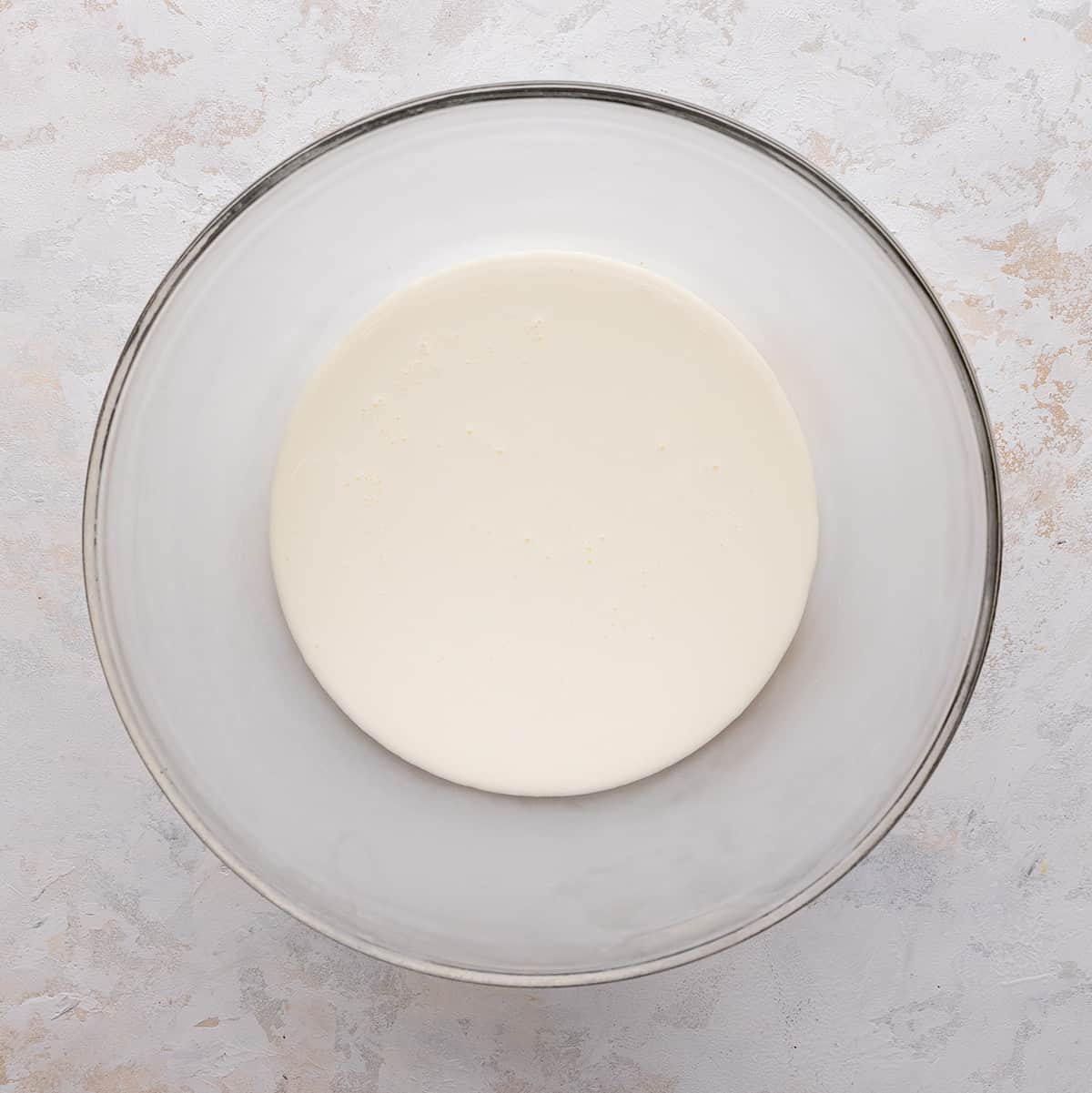heavy whipping cream in a glass bowl 