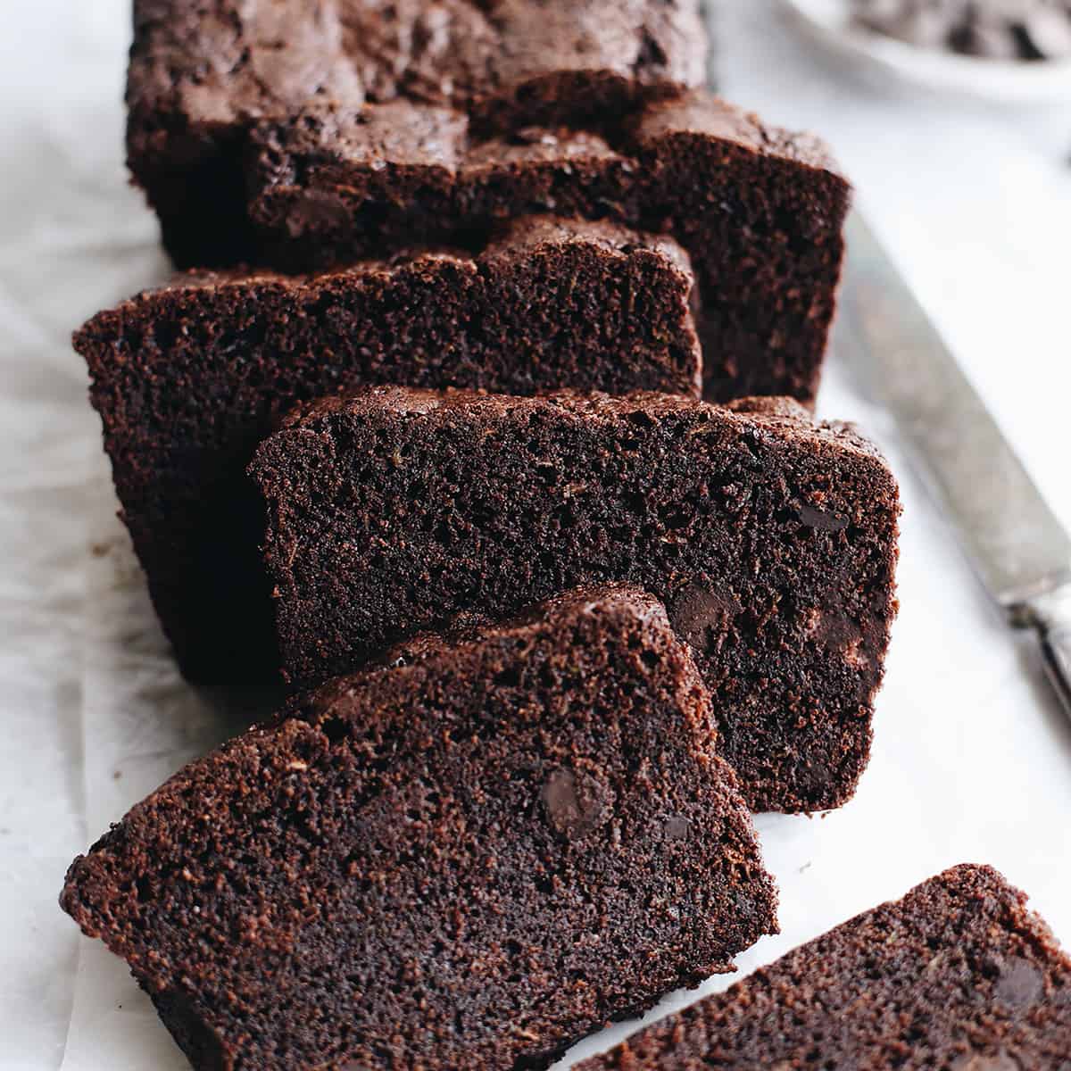 front view of 4 slices of chocolate zucchini bread