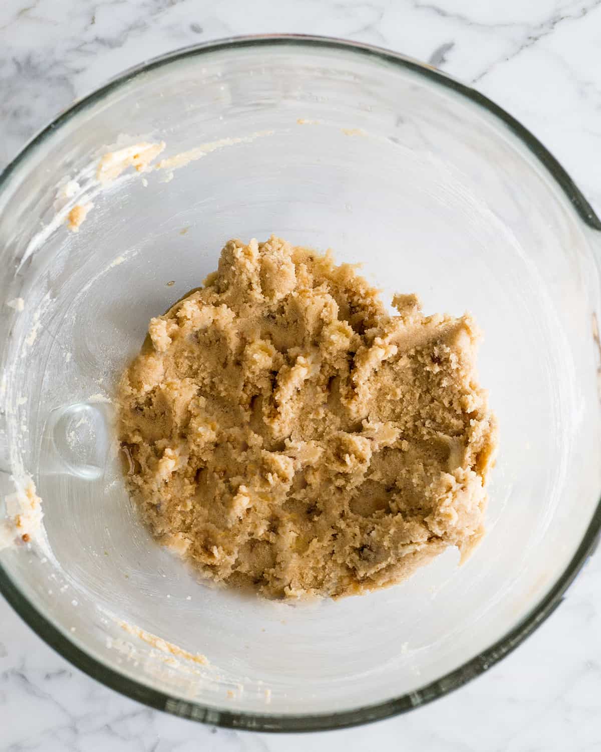 How to Make Oatmeal Cookies - butter & sugars in a bowl after creaming