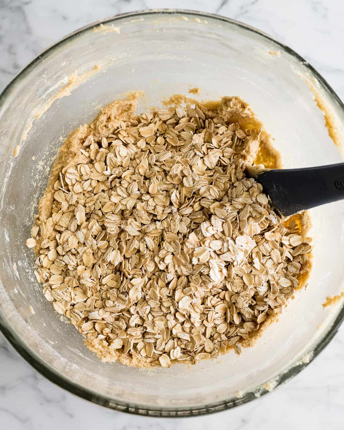 How to Make Oatmeal Cookies - adding oatmeal