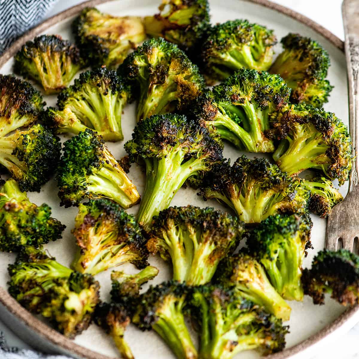 overhead view of oven roasted broccoli on a plate