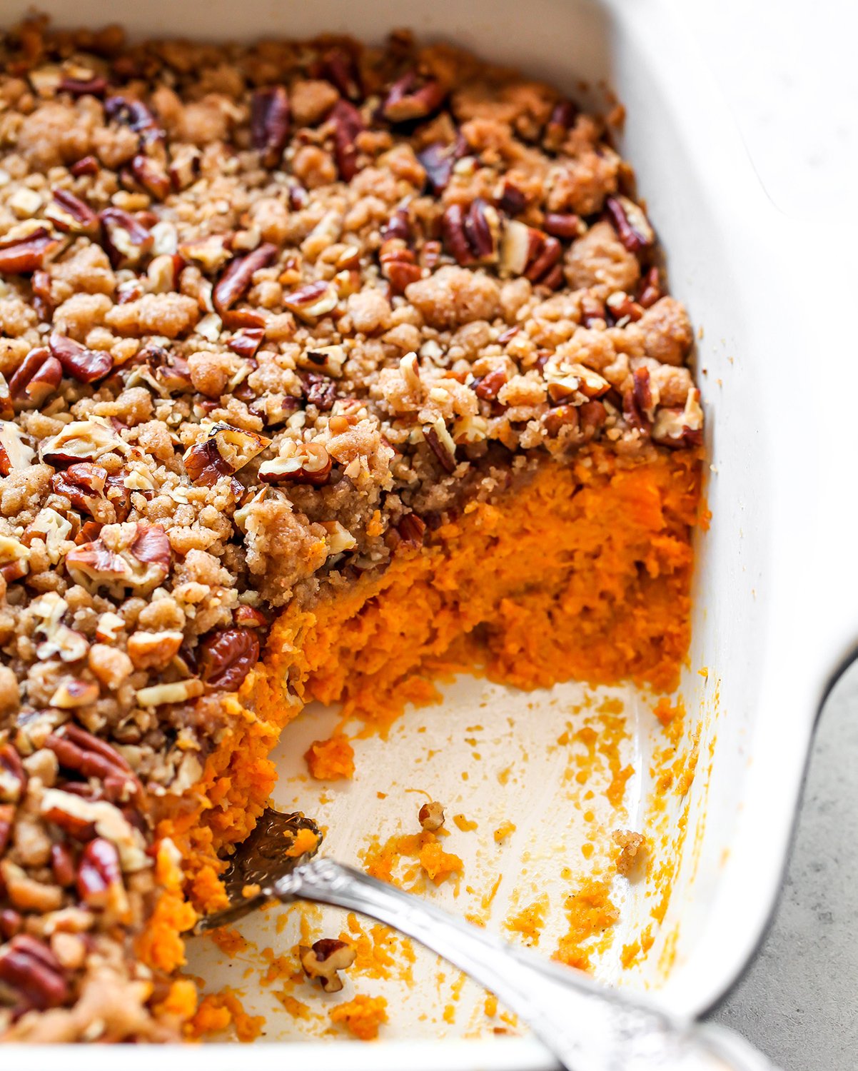 up close view of a sweet potato casserole and it's layers
